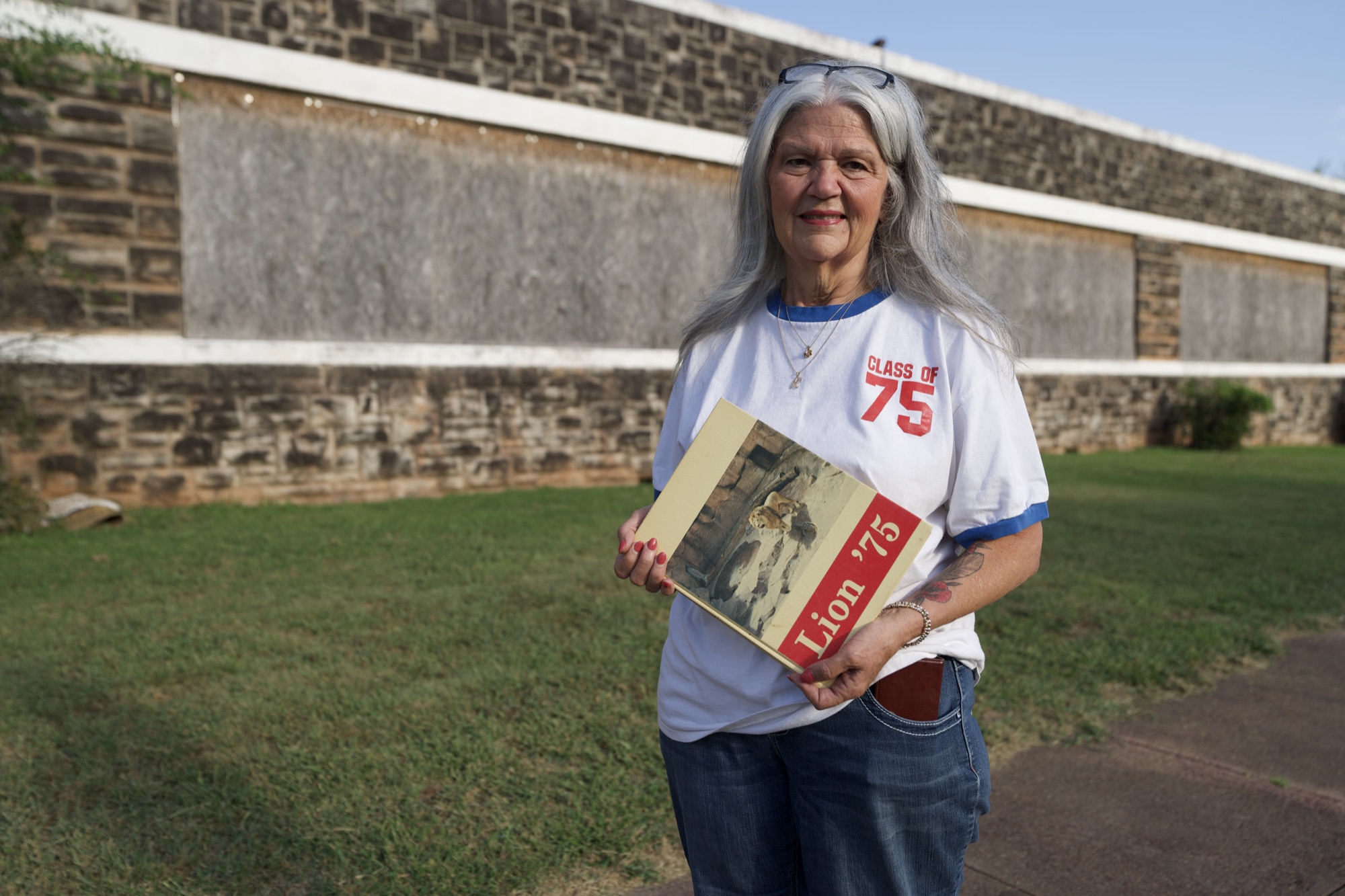 Kim Evans with her 1975 yearbook at Chandler Memorial High School